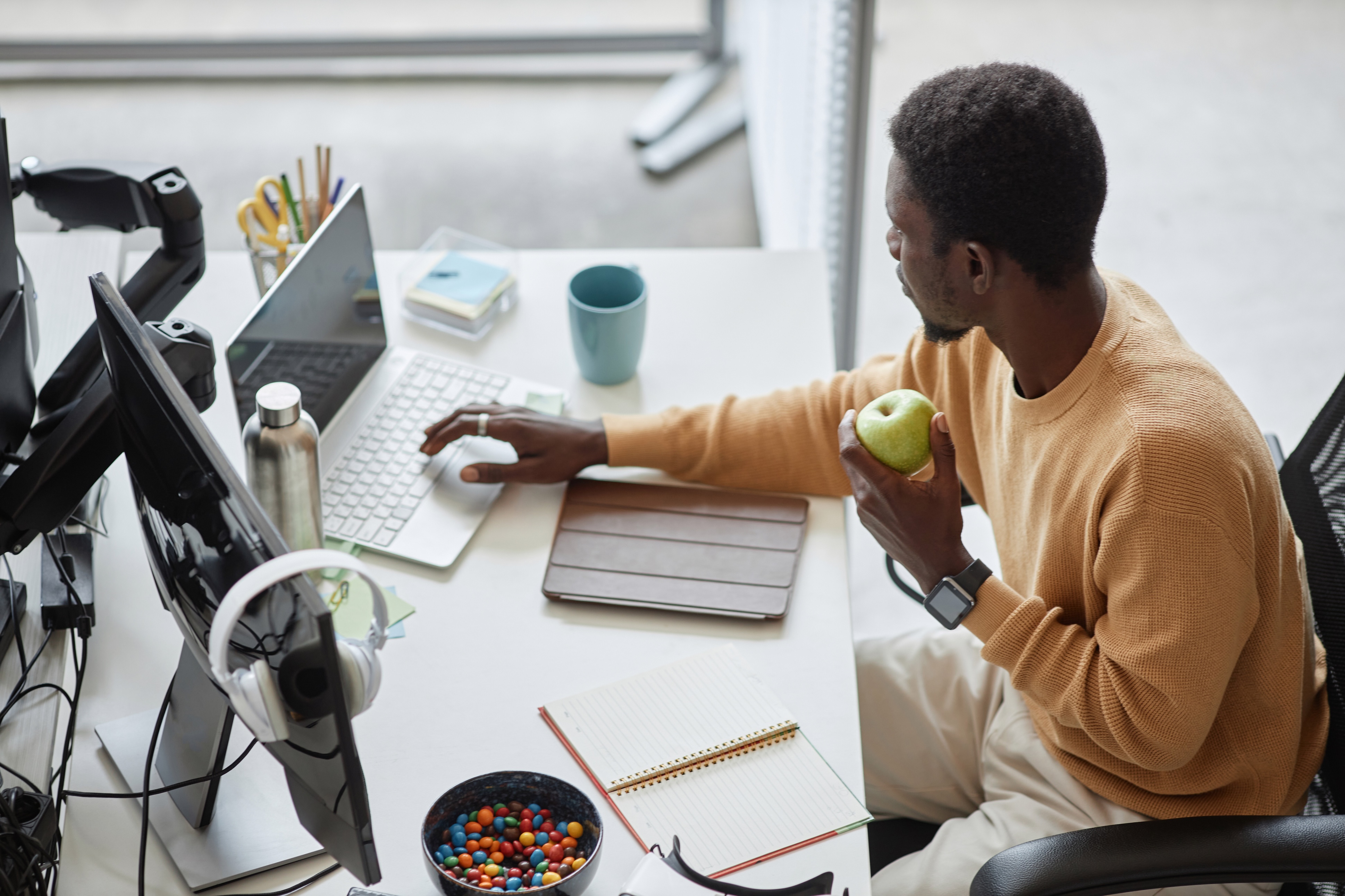 Man focused at his desk, showing how Crowdalert integrates seamlessly into daily workflows for efficient security management